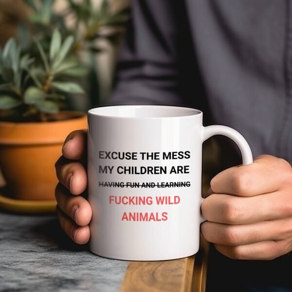 funny parenting mug held in two hands by man with plants